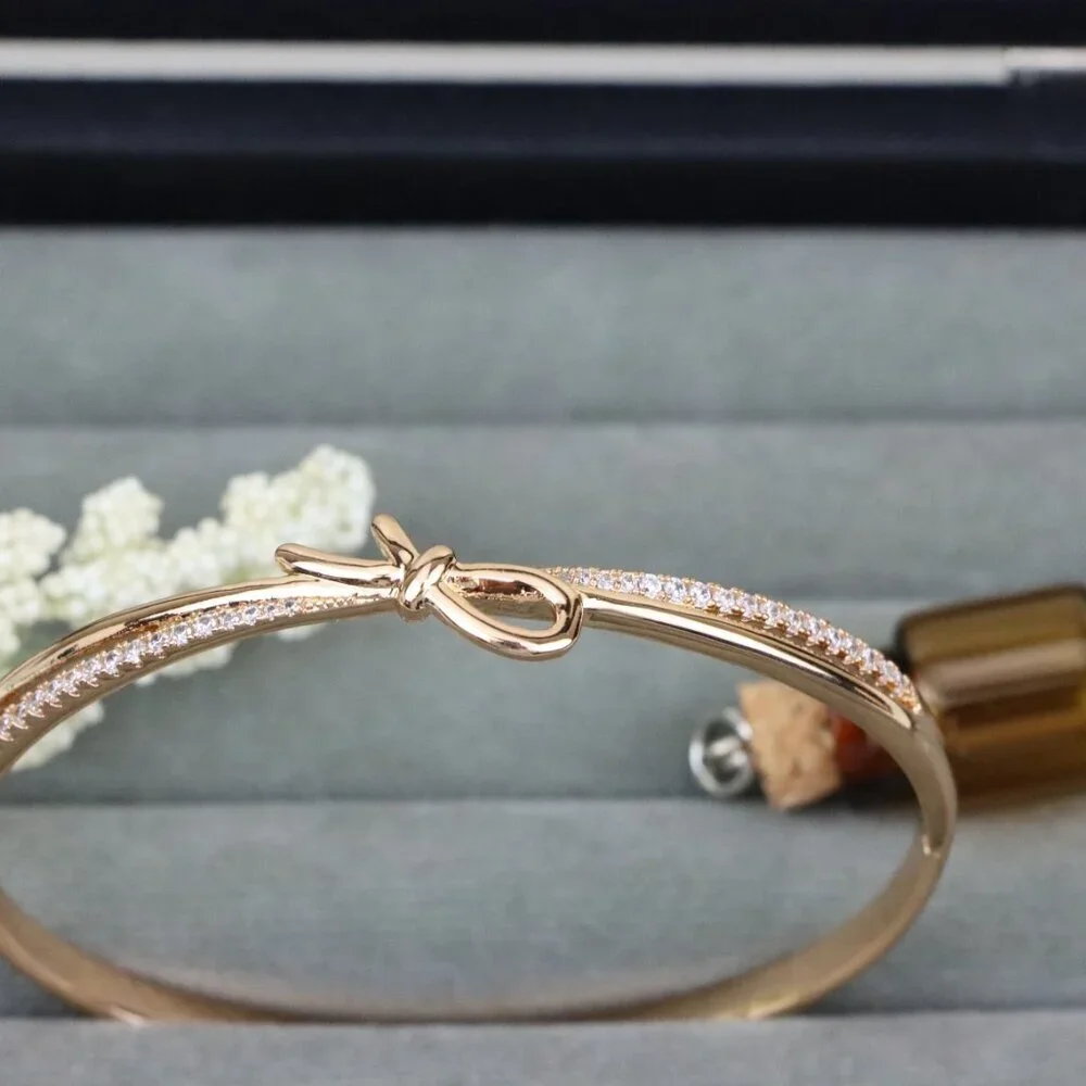 Rose Gold Bow Knot Bangle with Sparkling CZ Accents, XPBL0427